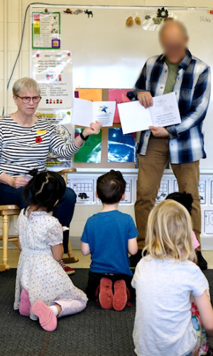 Karyn reading to Kindergarten classes.